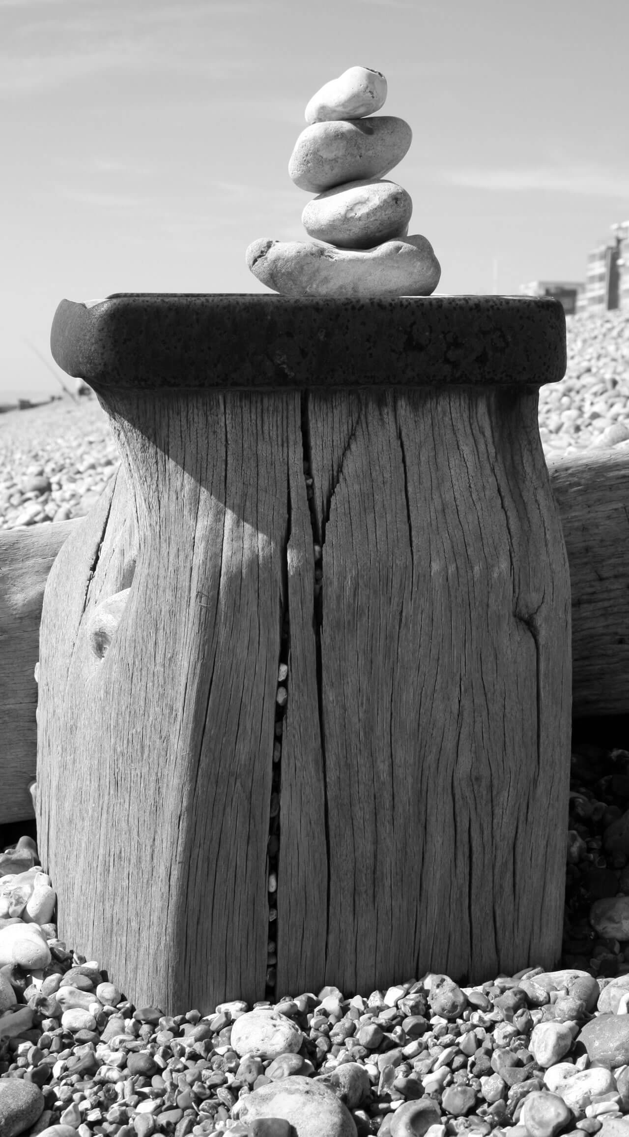 Balanced pebbles  on groyne